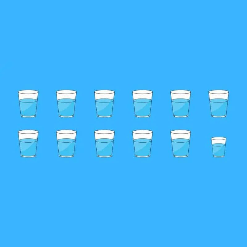 Half cups of water on a blue background